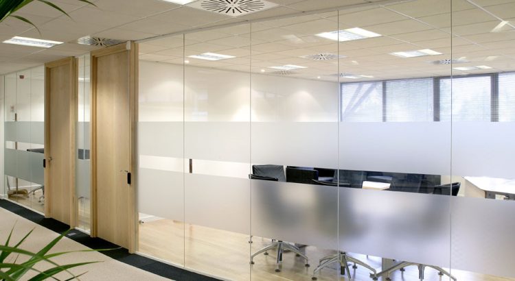 Frameless Glass Partitions: Elevating Interiors with Style and Functionality